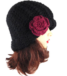 black beanie hat and red flower