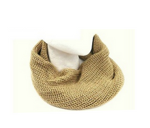 Beige knitted scarf on a white background